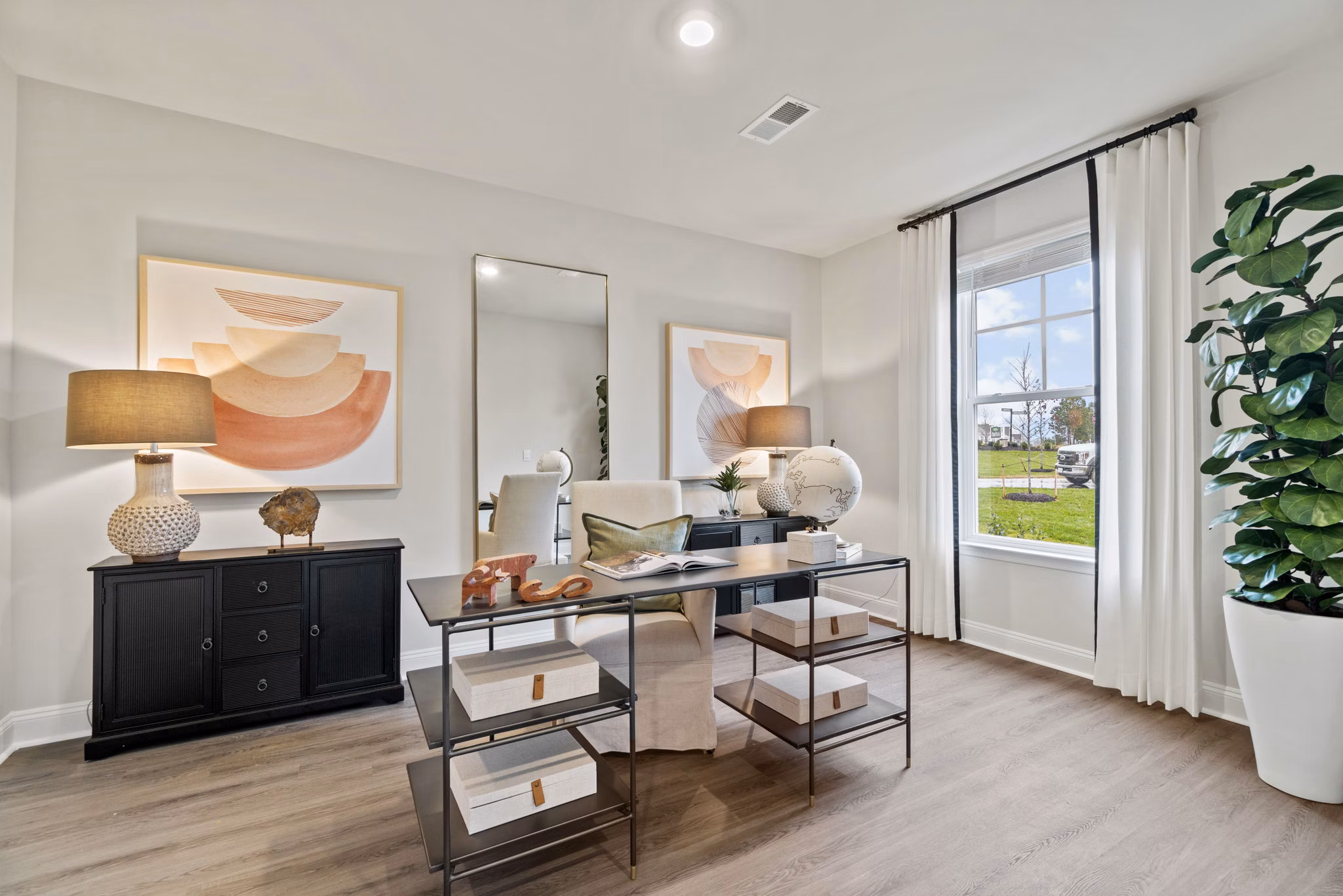 Stylish kitchen with granite countertops and stainless steel appliances in Maple Grove Apartments