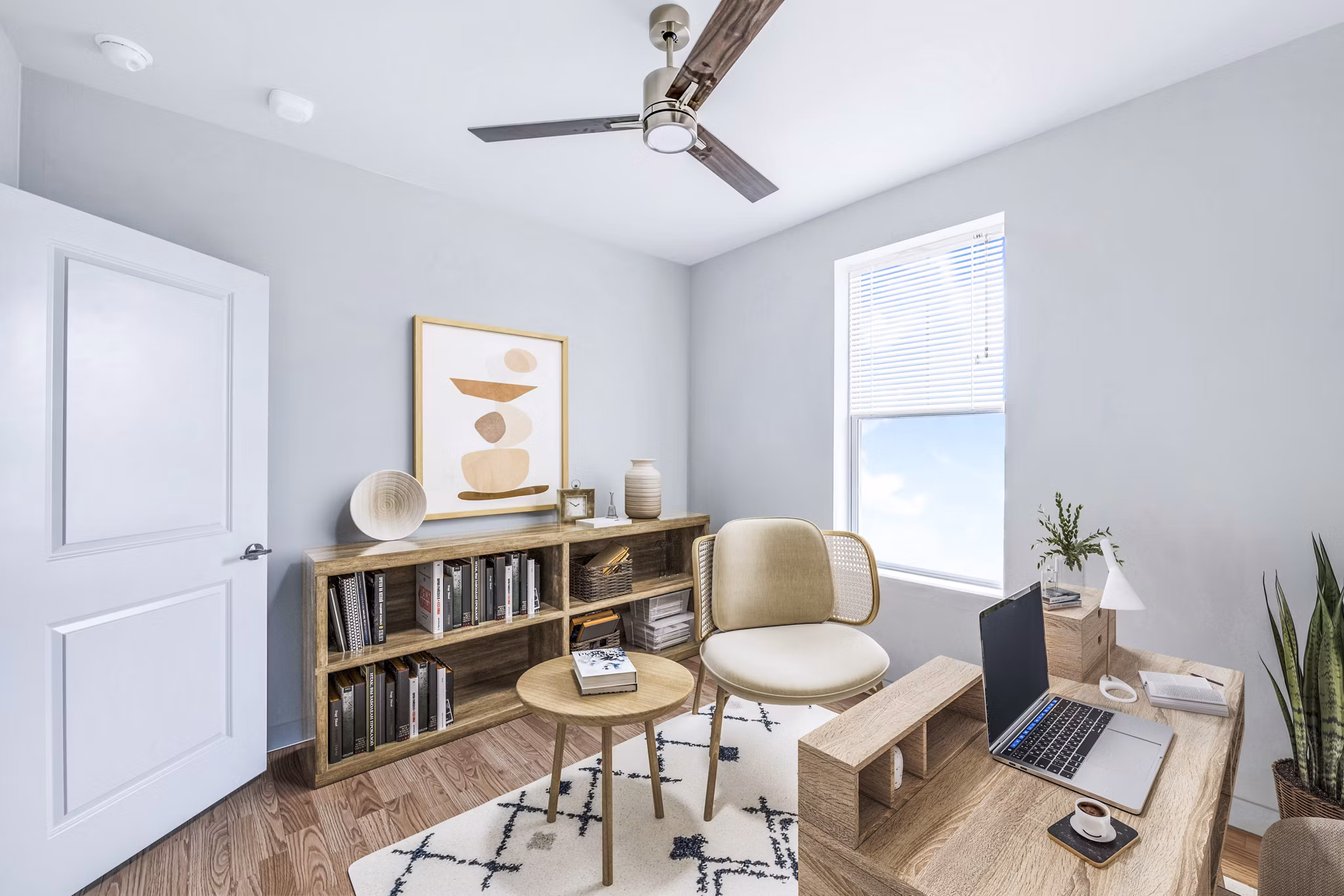 Modern home office/bedroom with stylish decor in Birchway Hudson Oaks Apartments