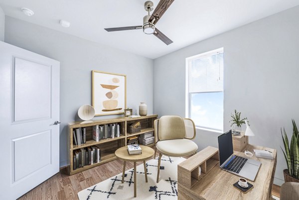 Modern home office/bedroom with stylish decor in Birchway Hudson Oaks Apartments