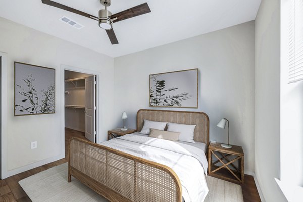 Modern bedroom with elegant decor in Birchway Hudson Oaks Apartments