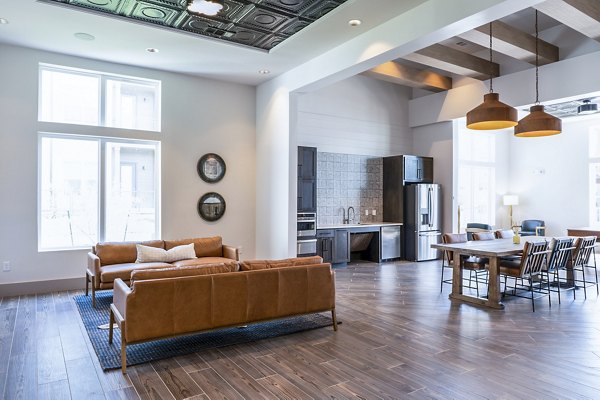 Stylish clubhouse lobby with modern seating at Birchway Hudson Oaks Apartments