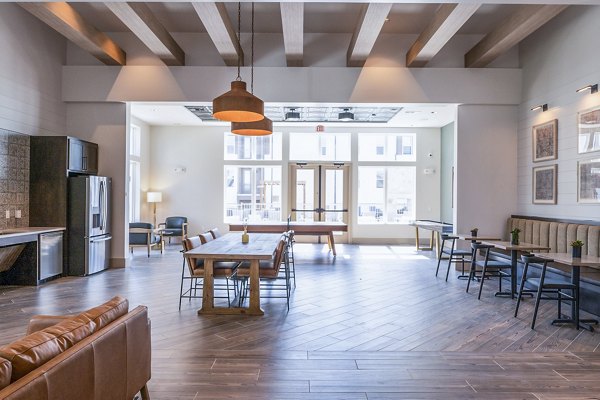 Clubhouse lobby with modern seating and decor at Birchway Hudson Oaks Apartments