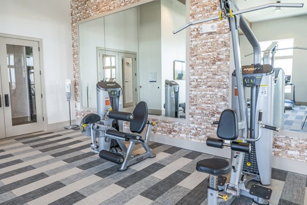 fitness center at Birchway Hudson Oaks Apartments