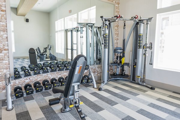 fitness center at Birchway Hudson Oaks Apartments