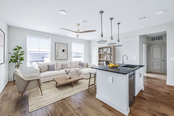 Spacious living room featuring modern decor in Birchway Hudson Oaks Apartments Perfect for luxury living