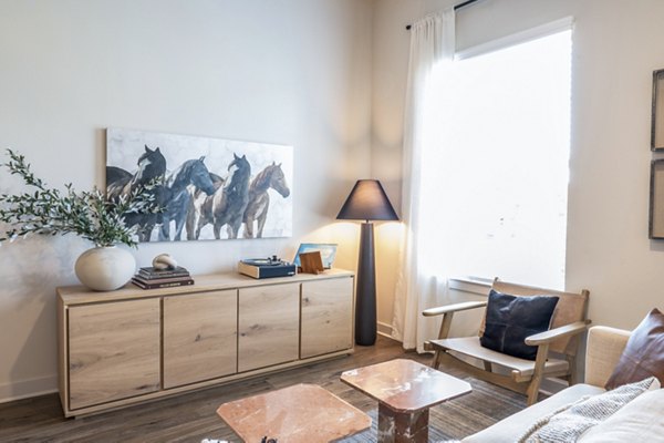 Modern living room with stylish furnishings in Birchway Hudson Oaks Apartments