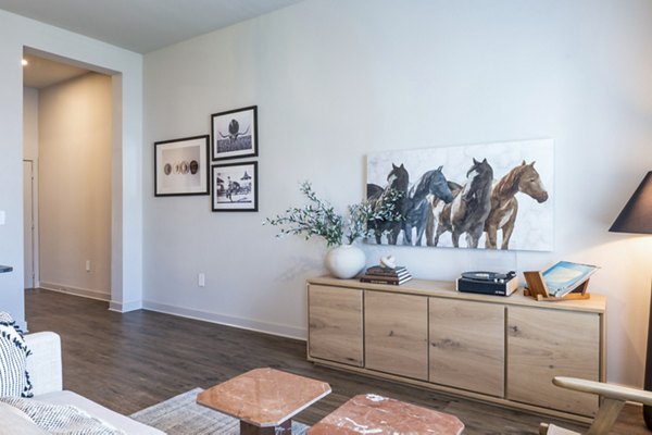 Spacious living room with modern decor at Birchway Hudson Oaks Apartments