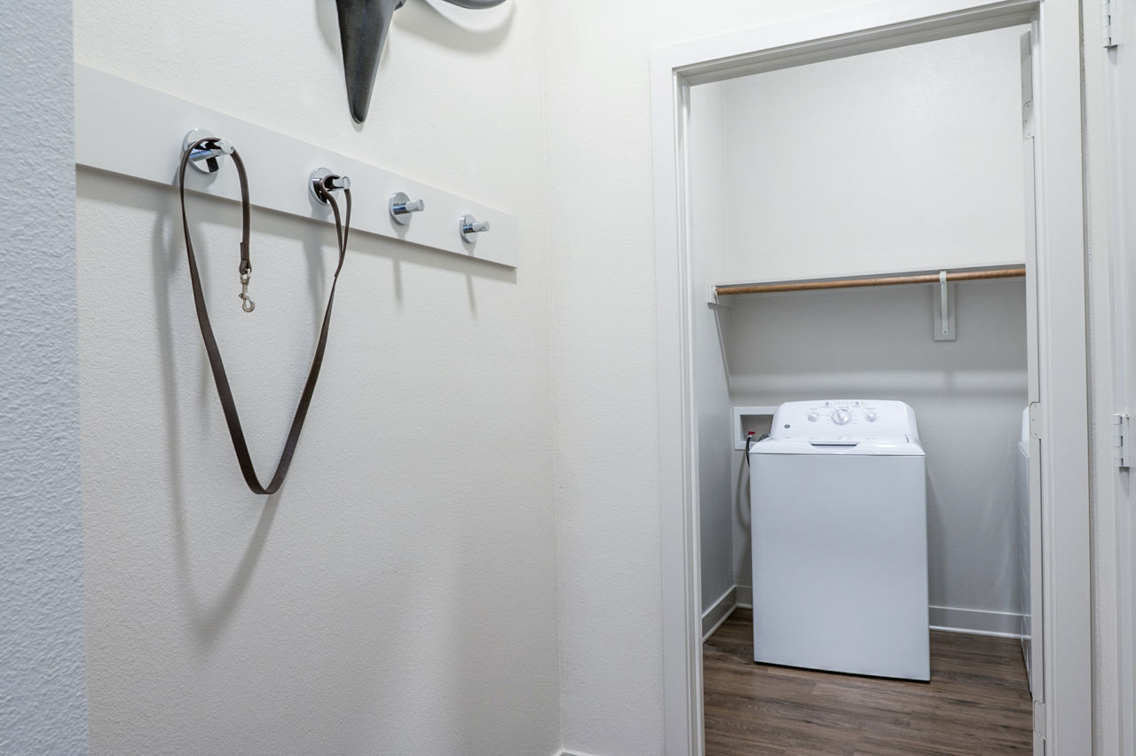 Laundry room at Birchway Hudson Oaks