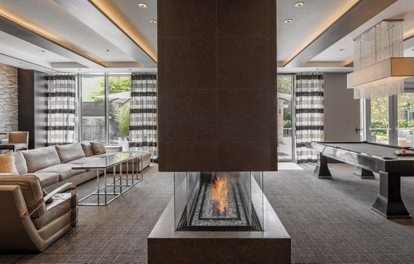 Modern clubhouse with stylish seating and co-working spaces at The Avant at Reston Town Center Apartments