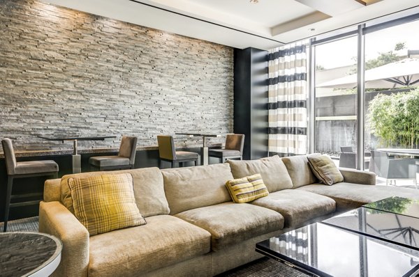 Clubhouse with modern amenities at The Avant at Reston Town Center Apartments, offering luxury spaces for gatherings and events
