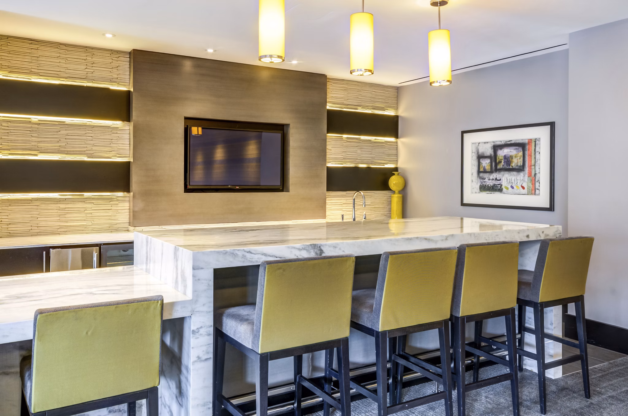 Clubhouse with modern design and seating areas at The Avant at Reston Town Center Apartments