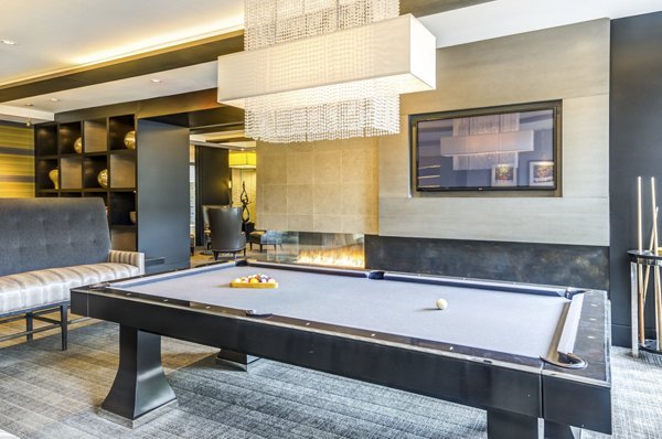 Clubhouse with modern furnishings at The Avant at Reston Town Center Apartments