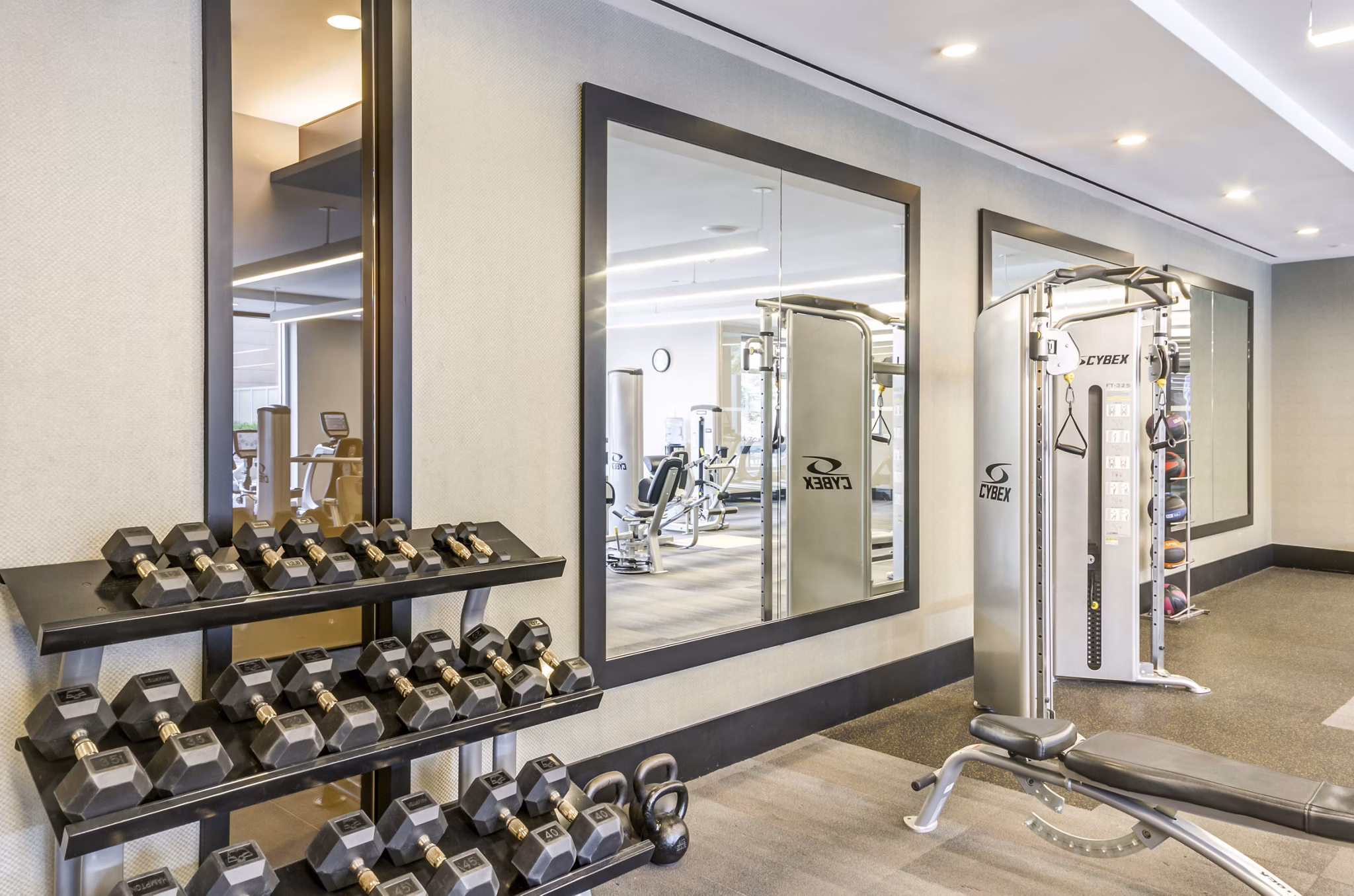 Fitness center with modern equipment at The Avant at Reston Town Center Apartments
