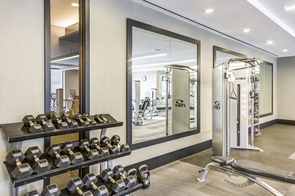 Fitness center with modern equipment at The Avant at Reston Town Center Apartments