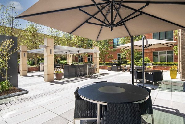Courtyard featuring lush landscaping at The Avant at Reston Town Center Apartments