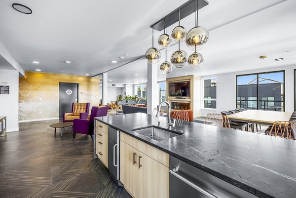 Elegant clubhouse with modern decor at Ion Town Center Apartments, offering a stylish community space for residents