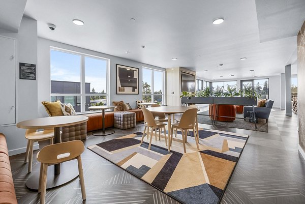 Ion Town Center Apartments: Modern clubhouse with contemporary seating and decor for luxury living