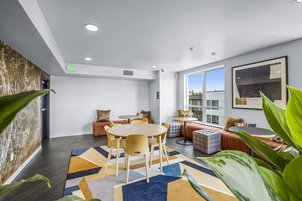 Clubhouse featuring modern dÃ©cor and seating at Ion Town Center Apartments