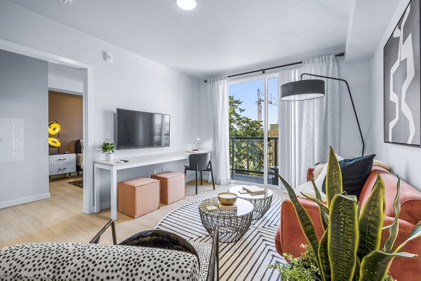 Spacious living room with modern decor in Ion Town Center Apartments