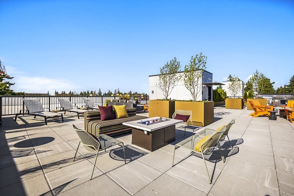 Cozy fire pit on the patio at Ion Town Center Apartments, perfect for outdoor gathering spots in this luxury apartment community