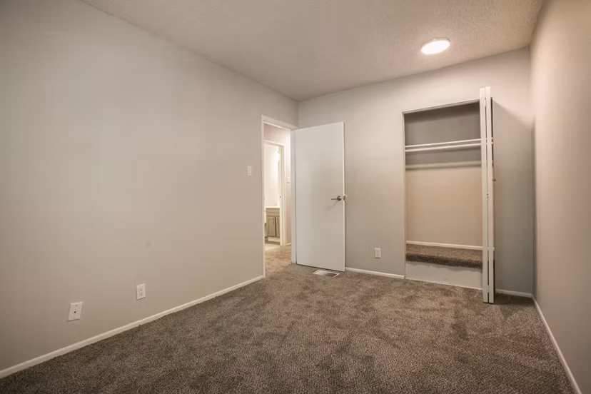 Cozy bedroom featuring modern decor at Sun Plaza Apartments, Greystar luxury apartments
