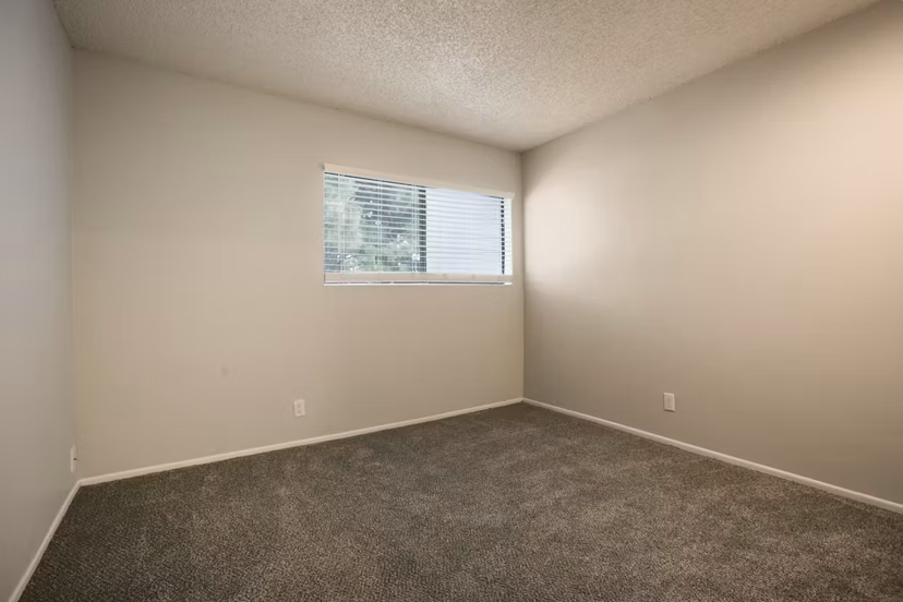 Spacious bedroom with elegant decor in Sun Plaza Apartments