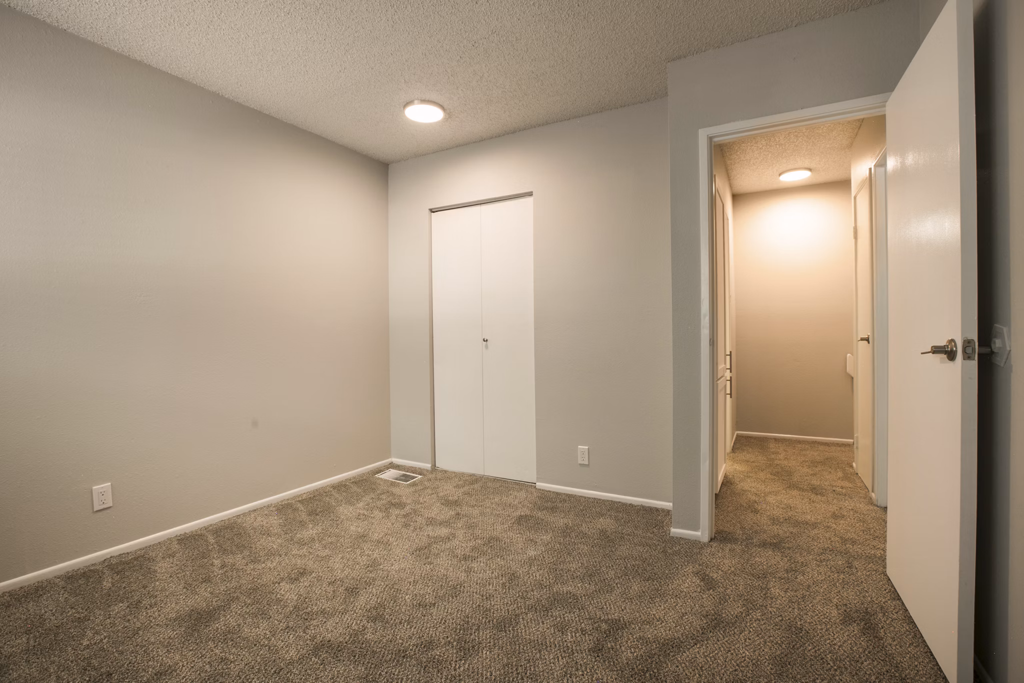 Cozy bedroom with elegant decor at Sun Plaza Apartments