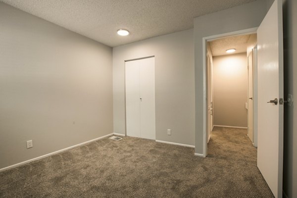 Cozy bedroom with elegant decor at Sun Plaza Apartments