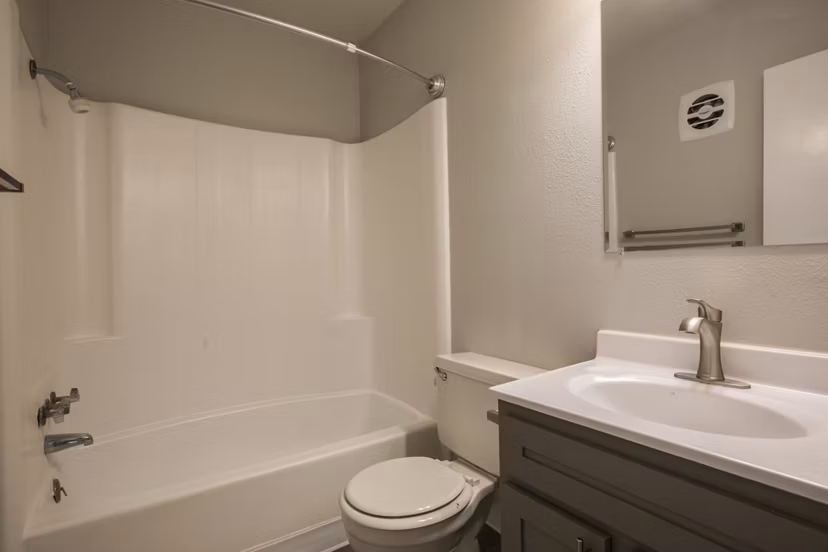 Modern bathroom with sleek fixtures at Sun Plaza Apartments, luxury living in a prime location