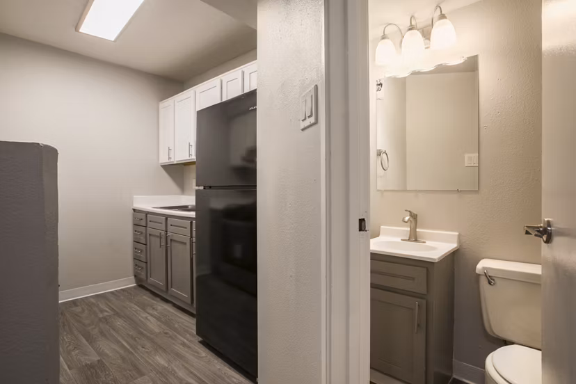 Modern hallway with sleek lighting and contemporary art in Sun Plaza Apartments