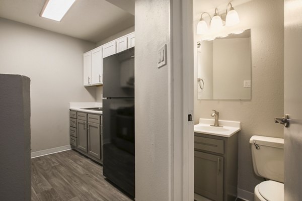 Modern hallway with sleek lighting and contemporary art in Sun Plaza Apartments
