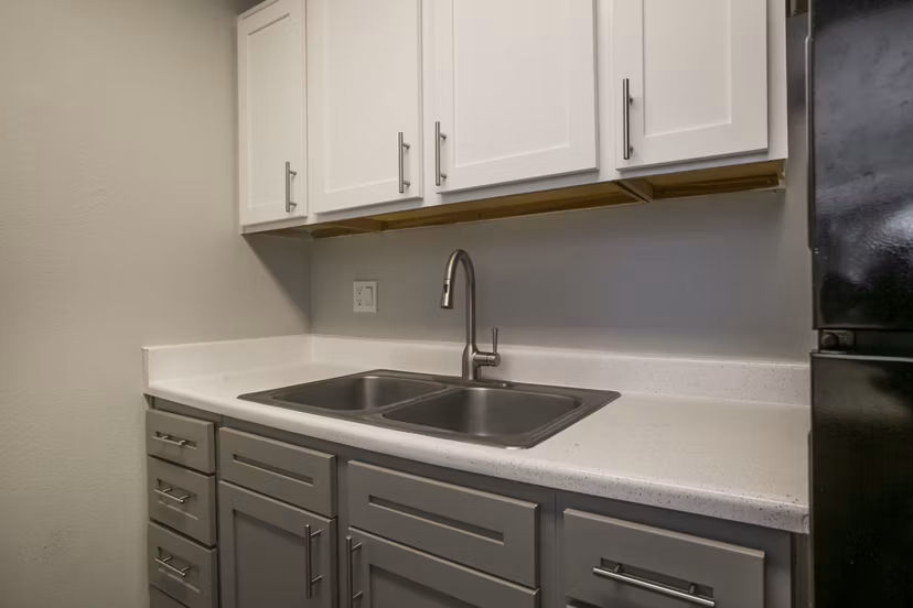 Modern kitchen with stainless steel appliances at Sun Plaza Apartments, Greystar's luxury community
