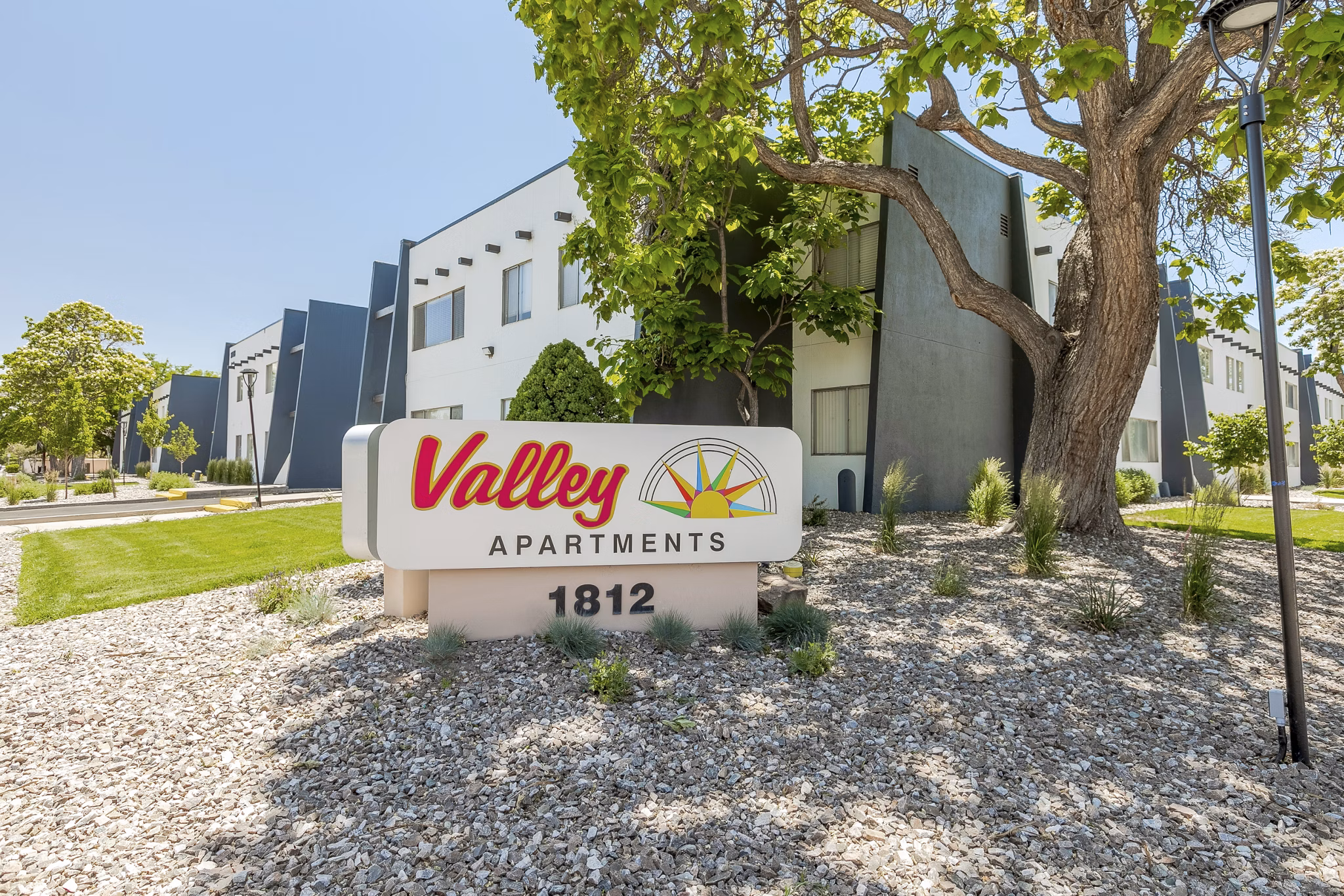 Valley Apartments: Modern signage at luxury apartment complex in desirable location