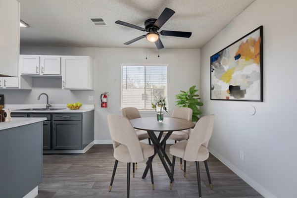 Elegant dining area with modern furnishings in Valley Apartments