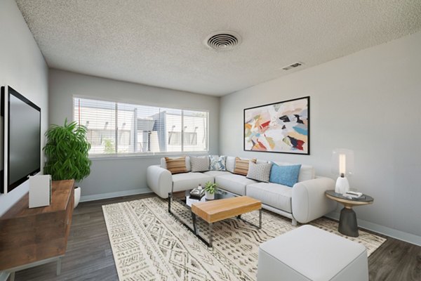 Spacious living room with modern decor at Valley Apartments, luxury Greystar property