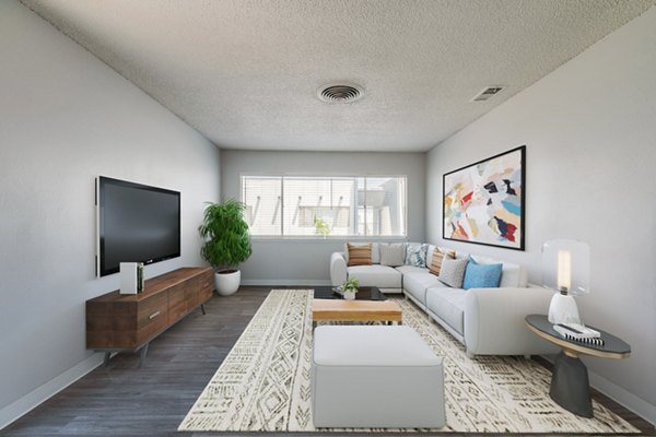 Spacious living room with modern decor in Valley Apartments offering luxury living