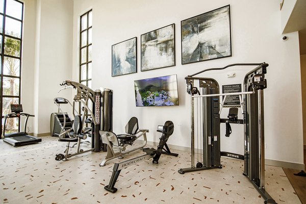 fitness center at The Crossing at Palm Aire Apartments