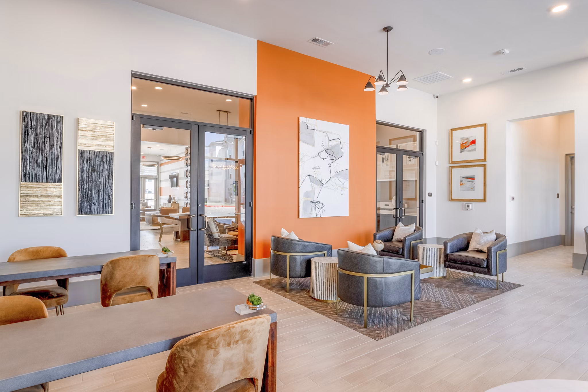 Modern clubhouse with plush seating and entertainment options at Espria Apartments luxury community