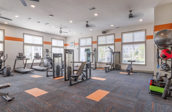 Fitness Center offering state-of-the-art equipment and spacious workout areas at Espria Apartments