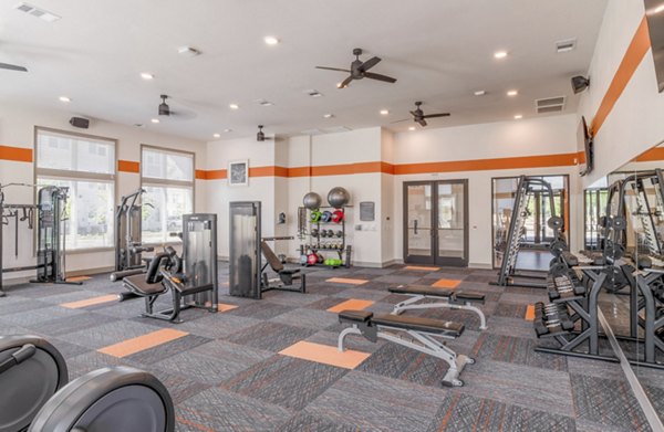 State-of-the-art fitness center with modern equipment at Espria Apartments