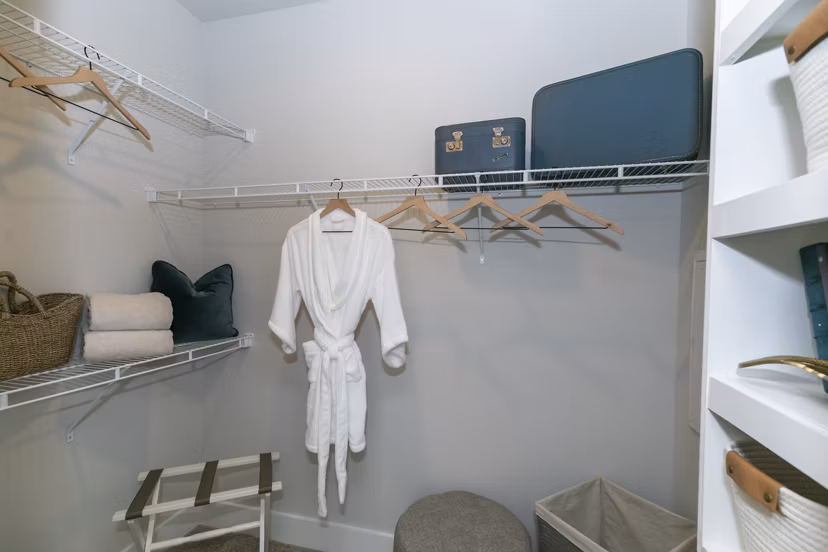 Spacious closet with ample storage space at Annabelle on Main Apartments, ideal for luxury living near downtown attractions