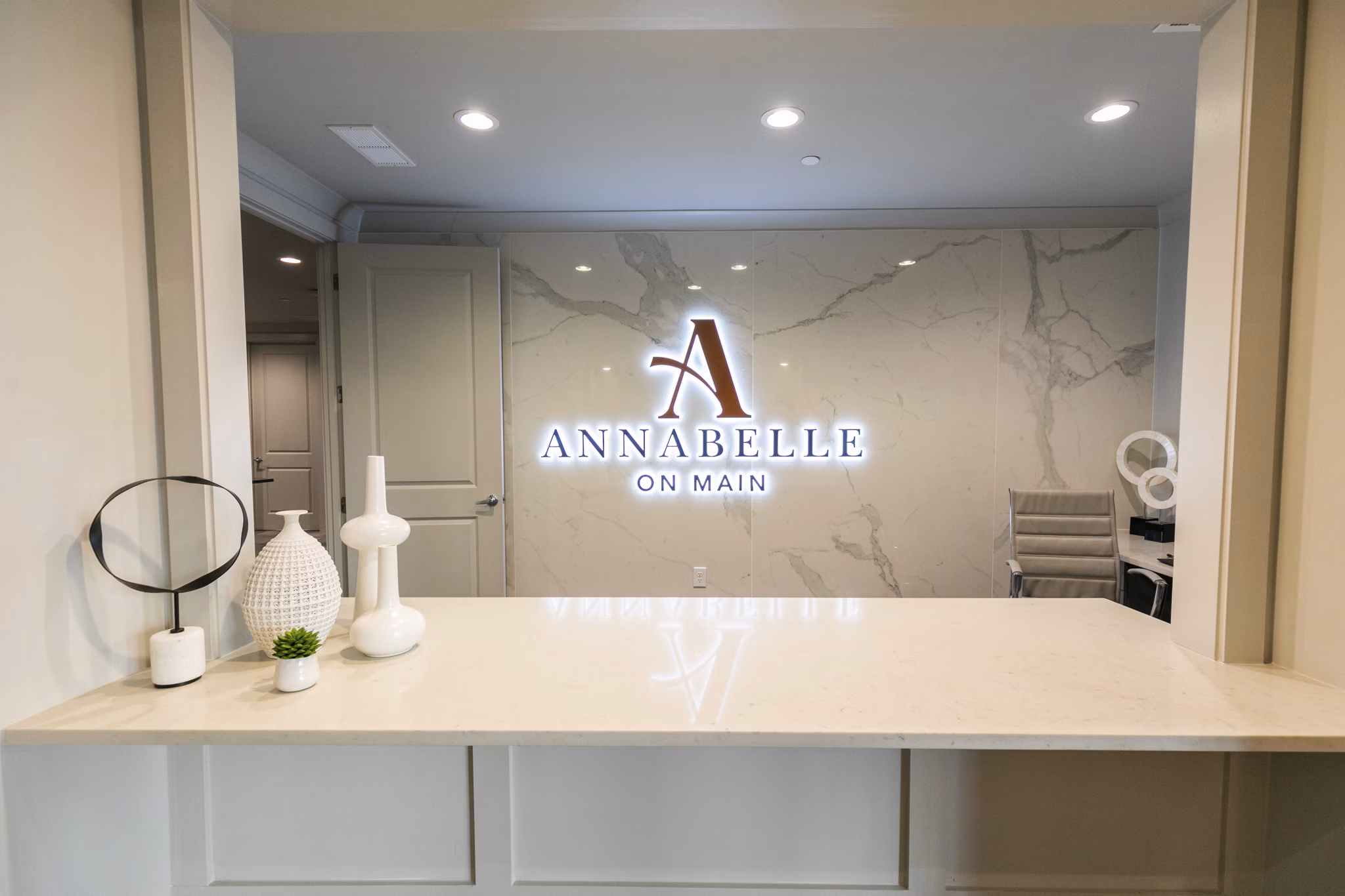 Clubhouse featuring modern seating and entertainment areas at Annabelle on Main Apartments