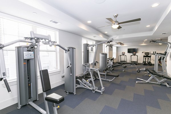 State-of-the-art fitness center featuring modern equipment at Annabelle on Main Apartments