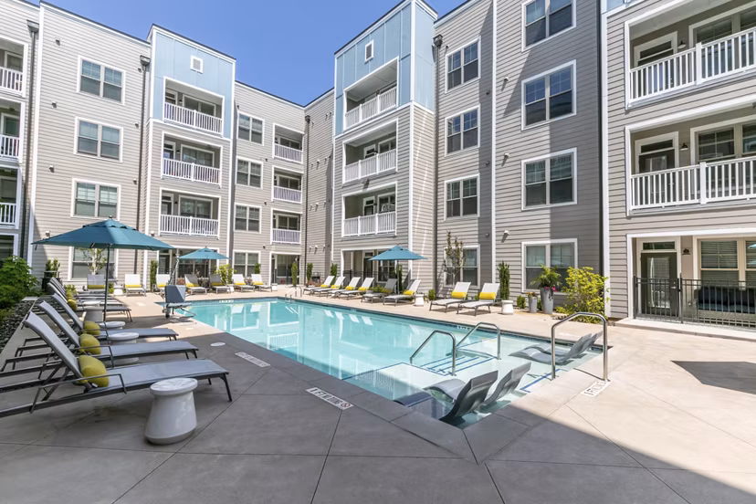 Resort-style pool at Annabelle on Main Apartments offering luxurious relaxation and recreation options for residents