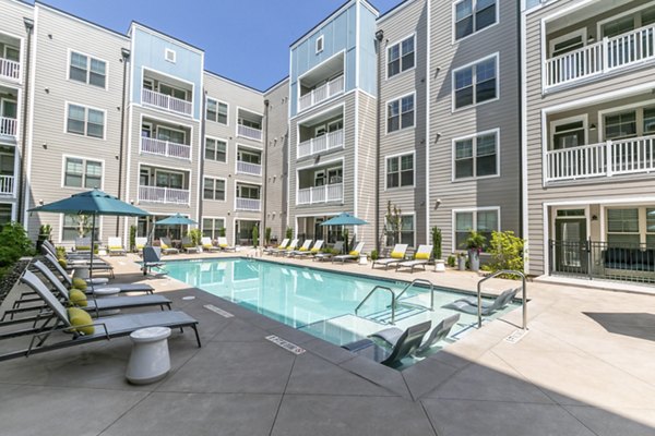 Resort-style pool at Annabelle on Main Apartments offering luxurious relaxation and recreation options for residents
