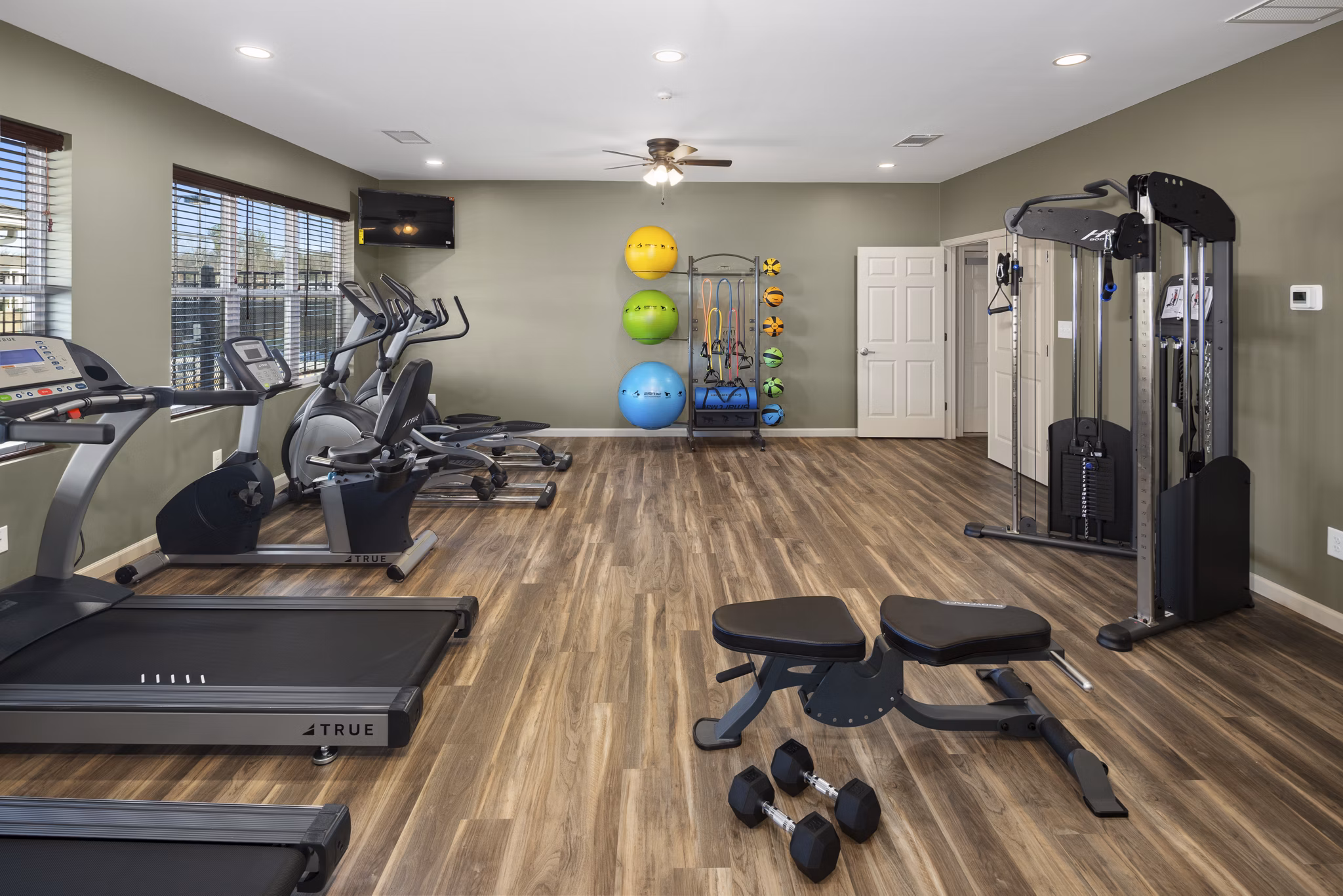 fitness center at The Ridge at Calhoun Apartments 