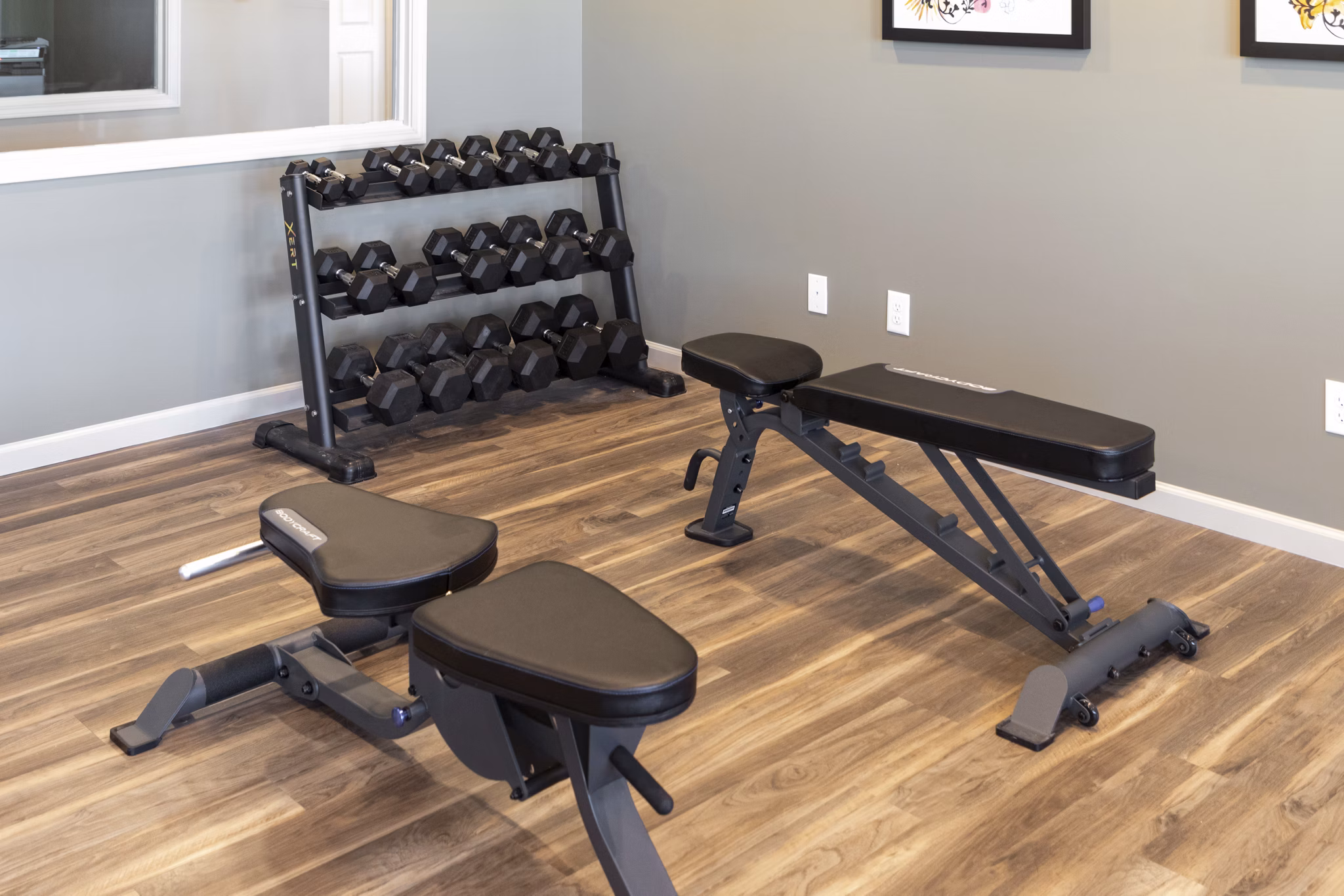 fitness center at The Ridge at Calhoun Apartments 