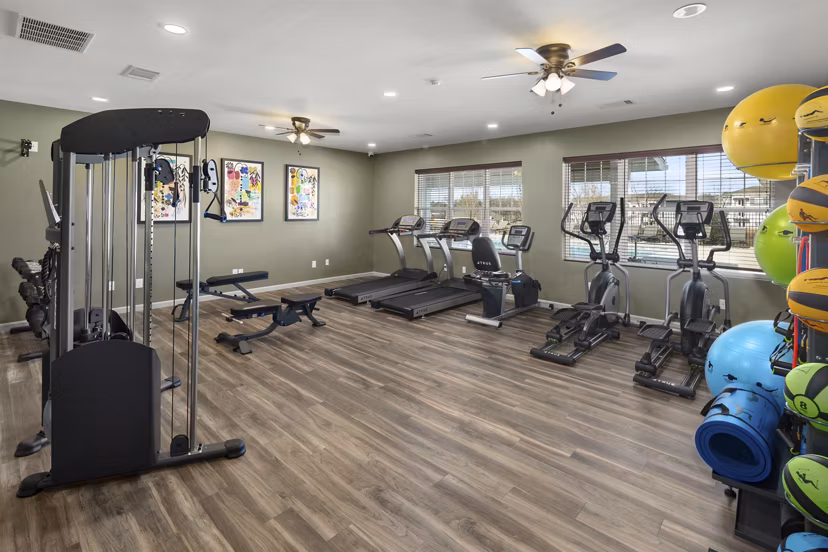 fitness center at The Ridge at Calhoun Apartments 