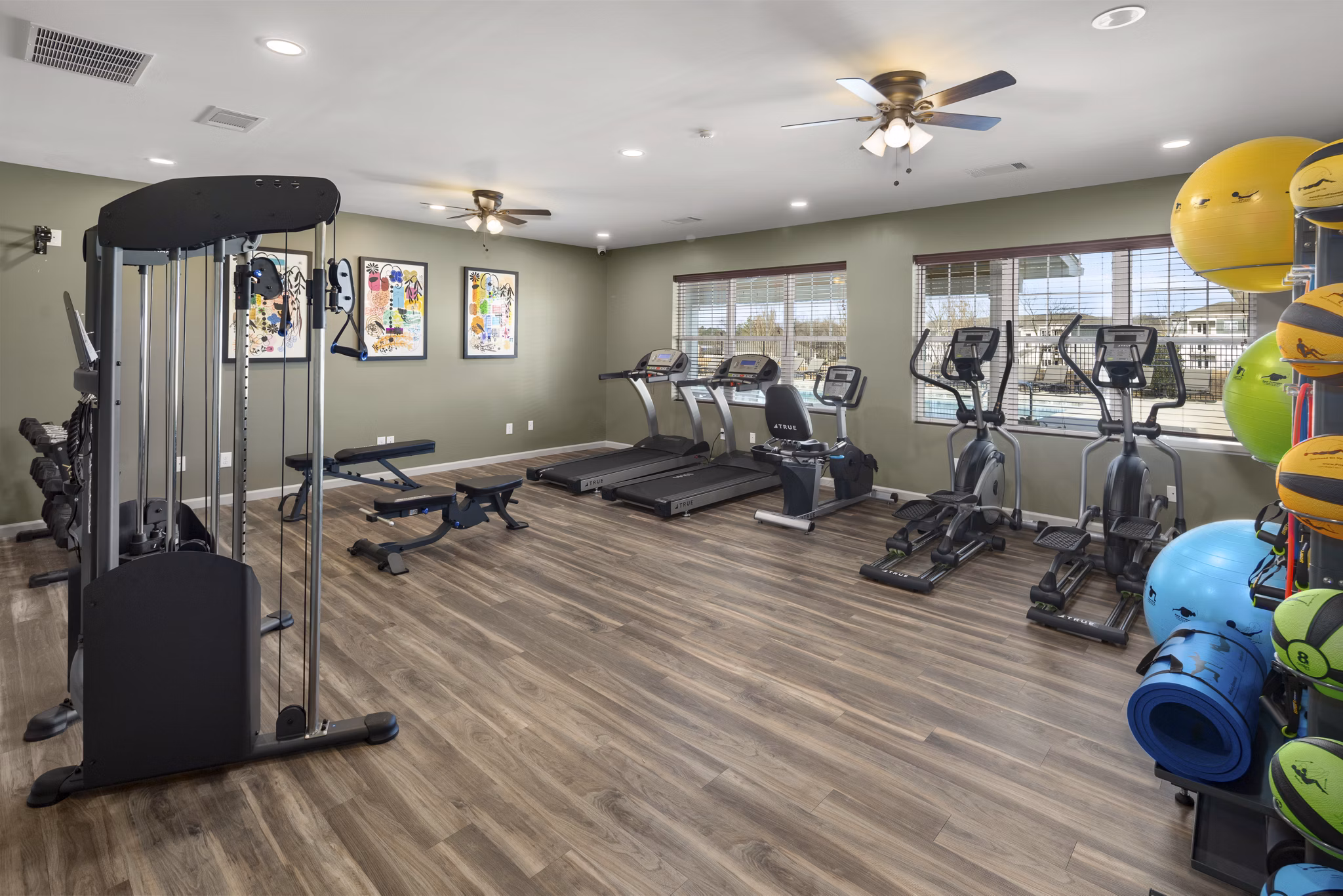 fitness center at The Ridge at Calhoun Apartments 