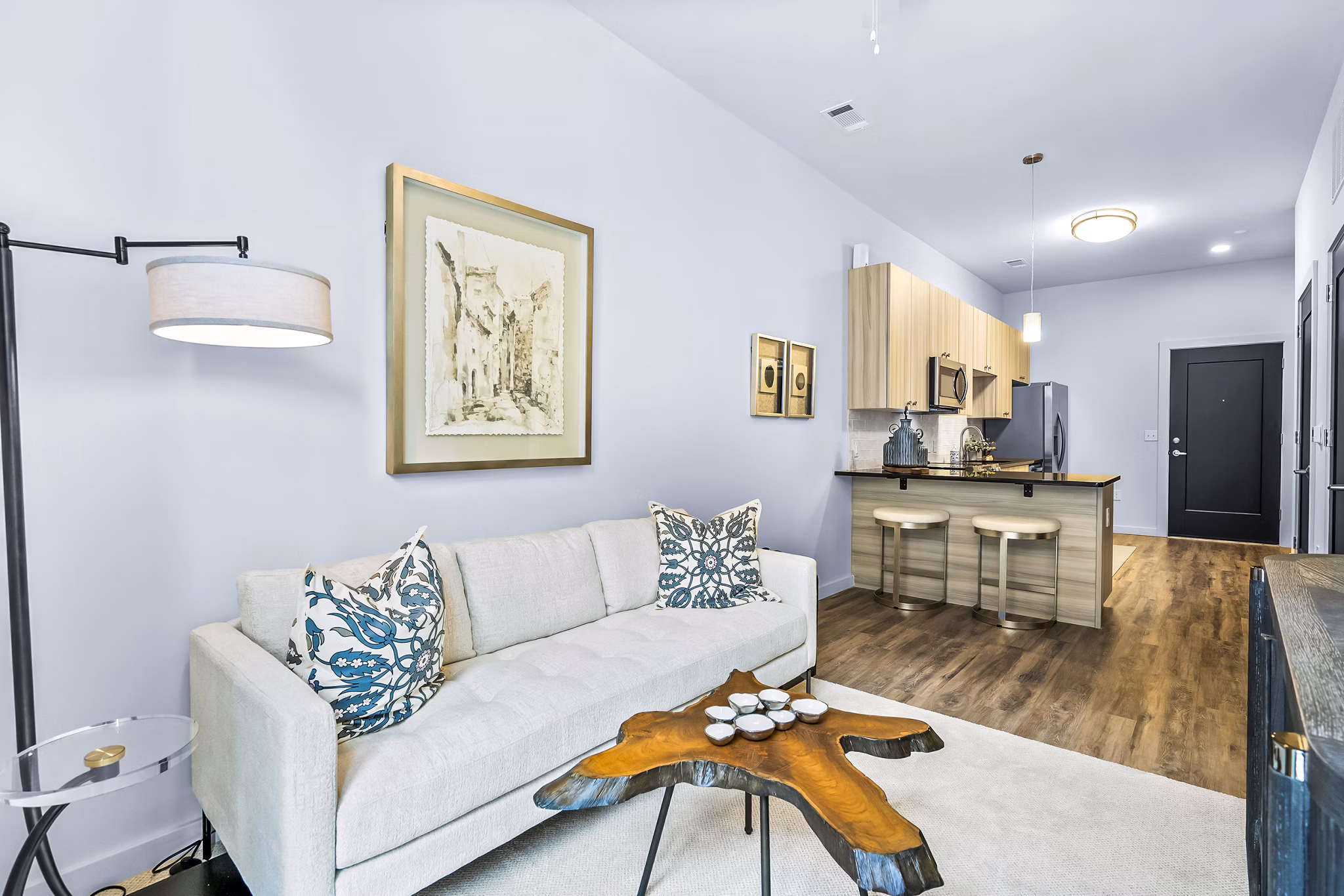 Spacious living room with modern decor in Avvio Apartments, luxury apartment living